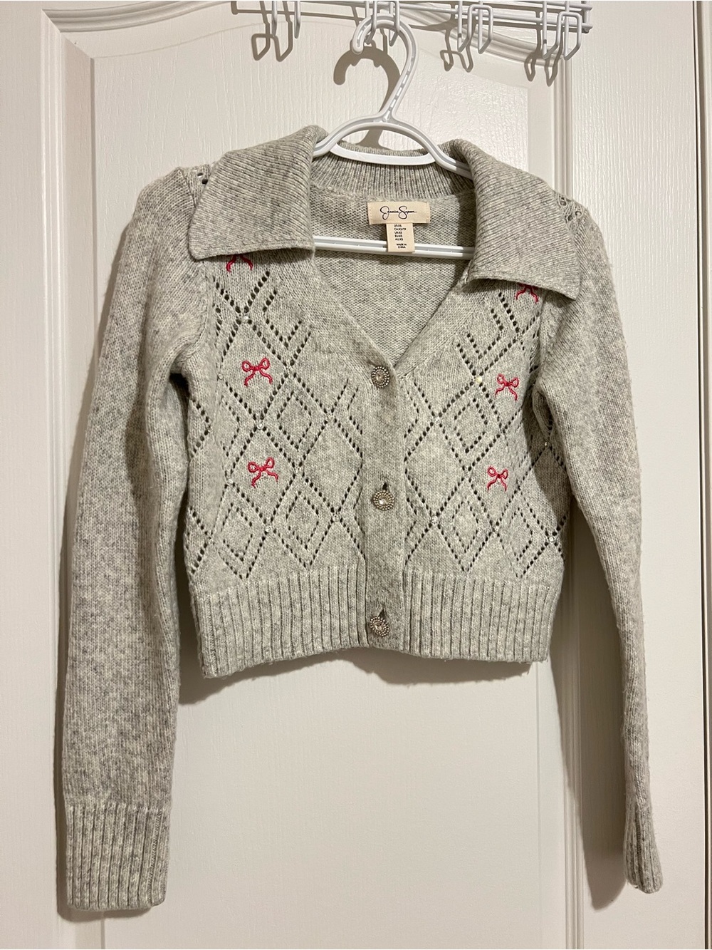 Jessica Simpson Light Gray Cropped Collared Cardigan with Pink Bow Accents